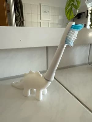 Cute Stylized Dinosaur Toothbrush Holder